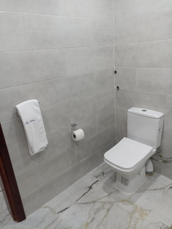 Mji Group Hotel Тан-Тан Екстериор снимка