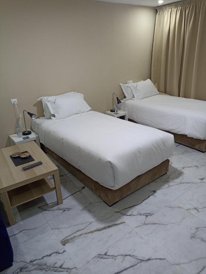 Mji Group Hotel Тан-Тан Екстериор снимка