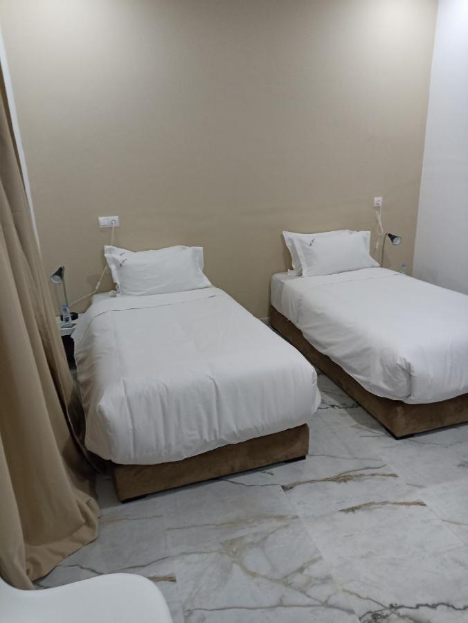 Mji Group Hotel Тан-Тан Екстериор снимка