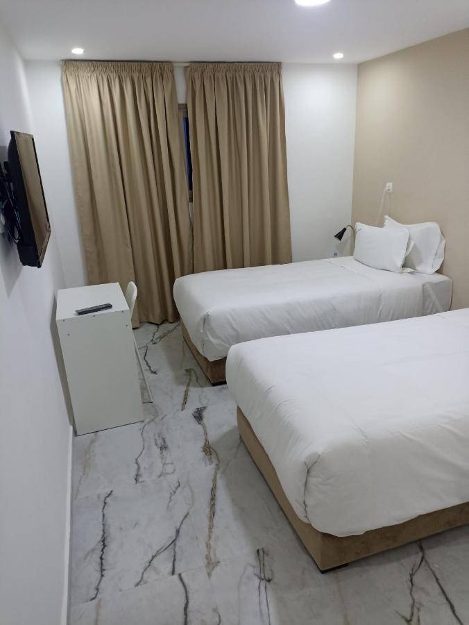 Mji Group Hotel Тан-Тан Екстериор снимка