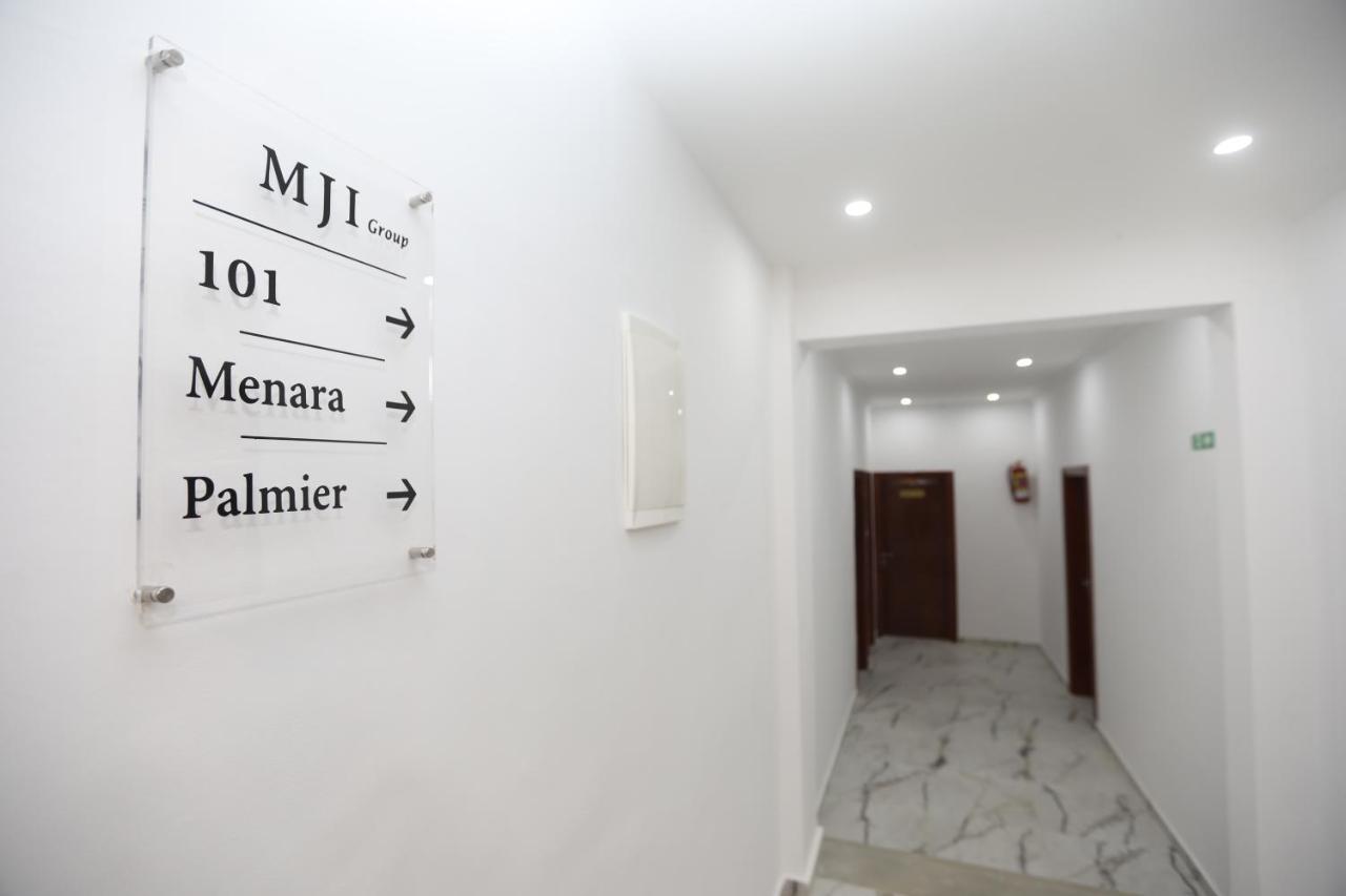 Mji Group Hotel Тан-Тан Екстериор снимка