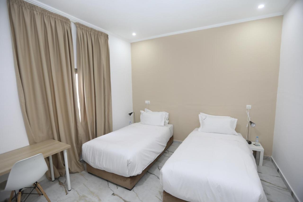 Mji Group Hotel Тан-Тан Екстериор снимка