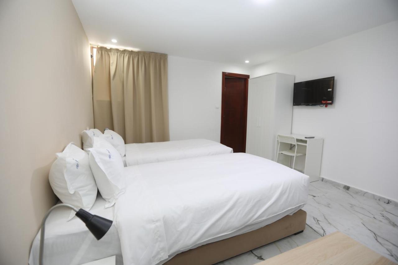Mji Group Hotel Тан-Тан Екстериор снимка