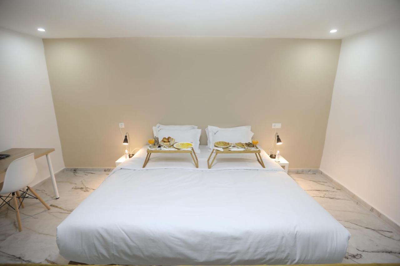 Mji Group Hotel Тан-Тан Екстериор снимка