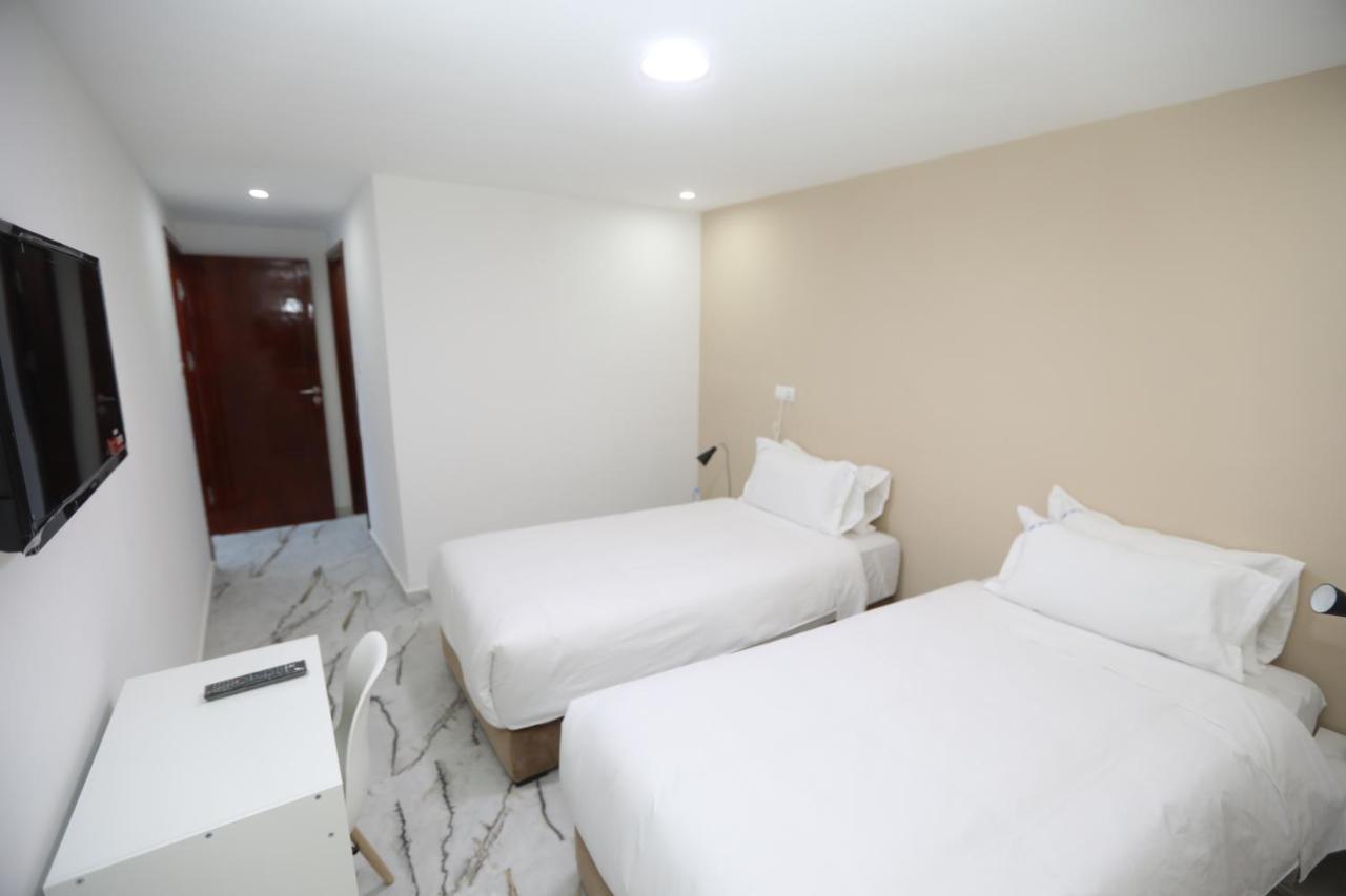Mji Group Hotel Тан-Тан Екстериор снимка