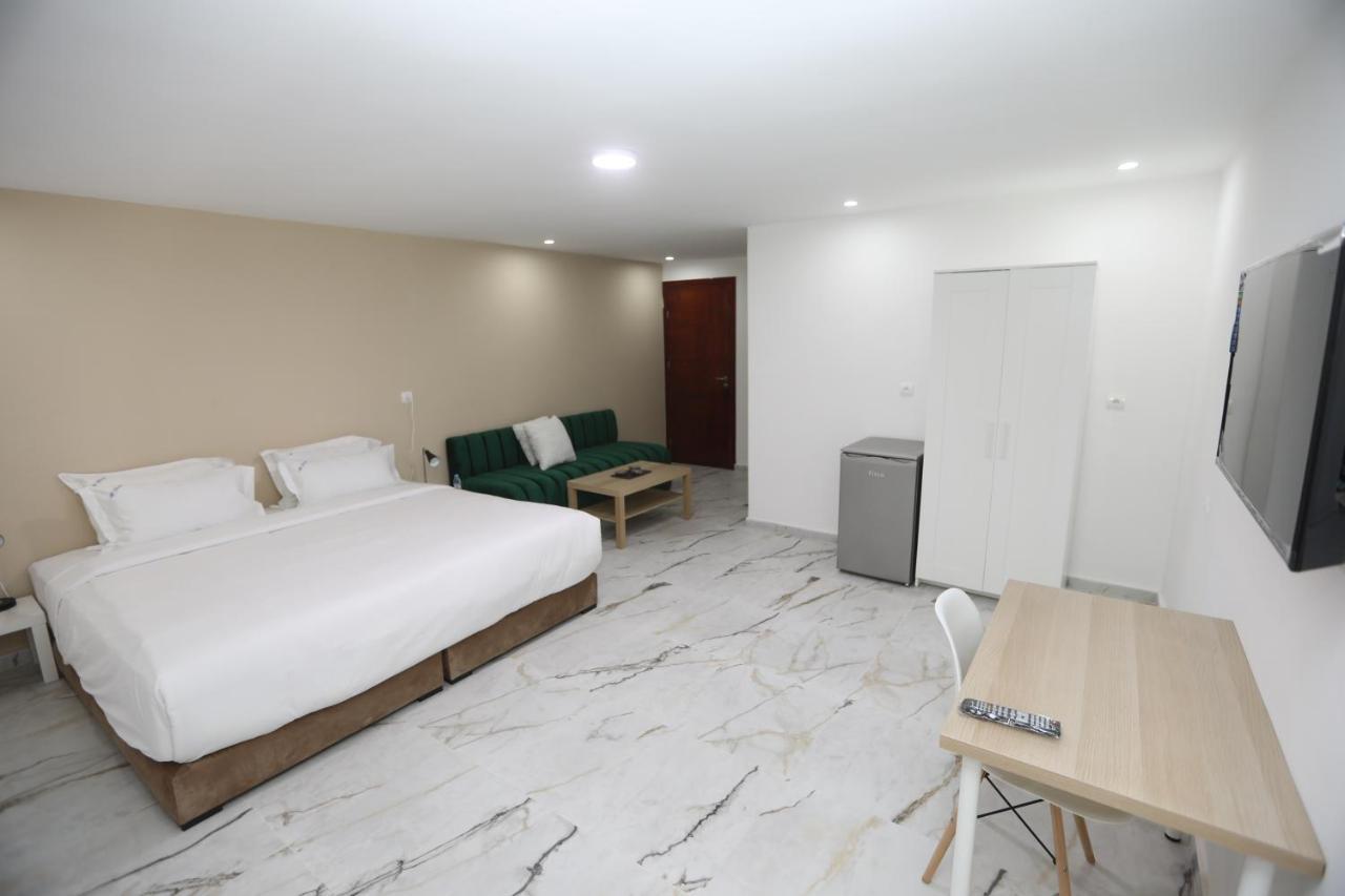 Mji Group Hotel Тан-Тан Екстериор снимка