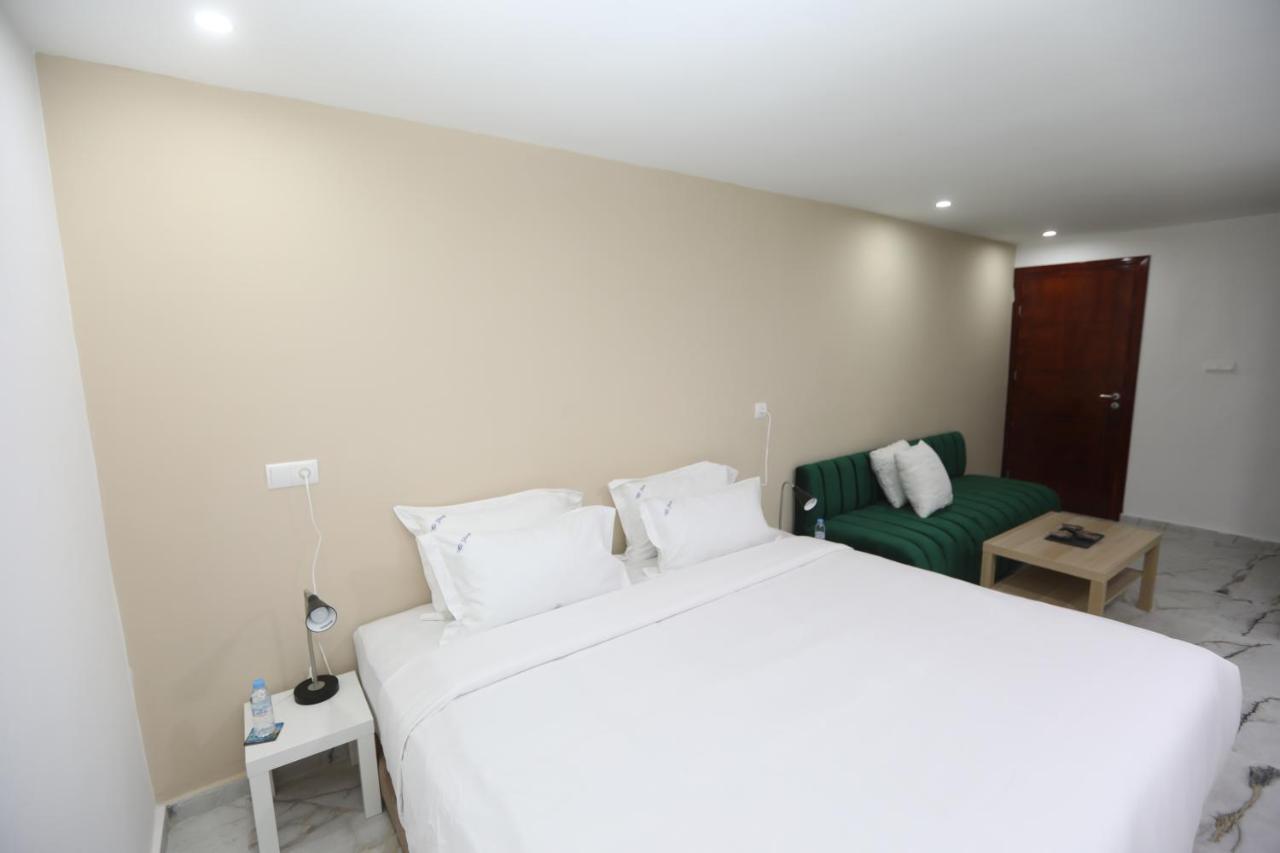 Mji Group Hotel Тан-Тан Екстериор снимка