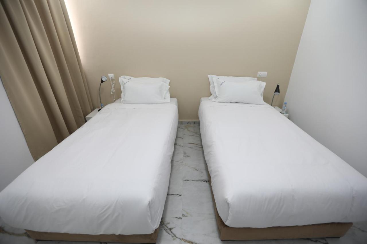 Mji Group Hotel Тан-Тан Екстериор снимка