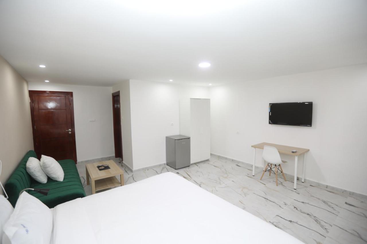Mji Group Hotel Тан-Тан Екстериор снимка