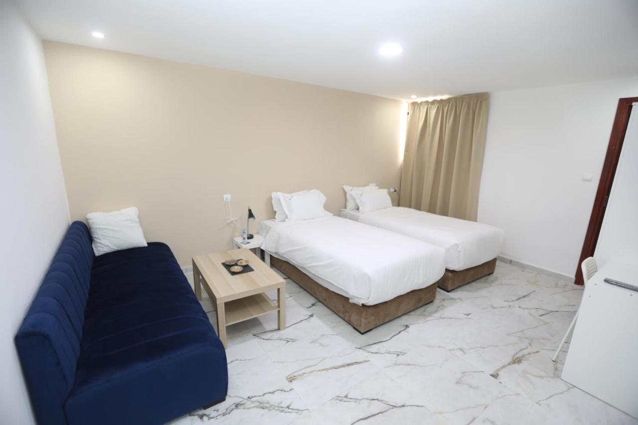 Mji Group Hotel Тан-Тан Екстериор снимка