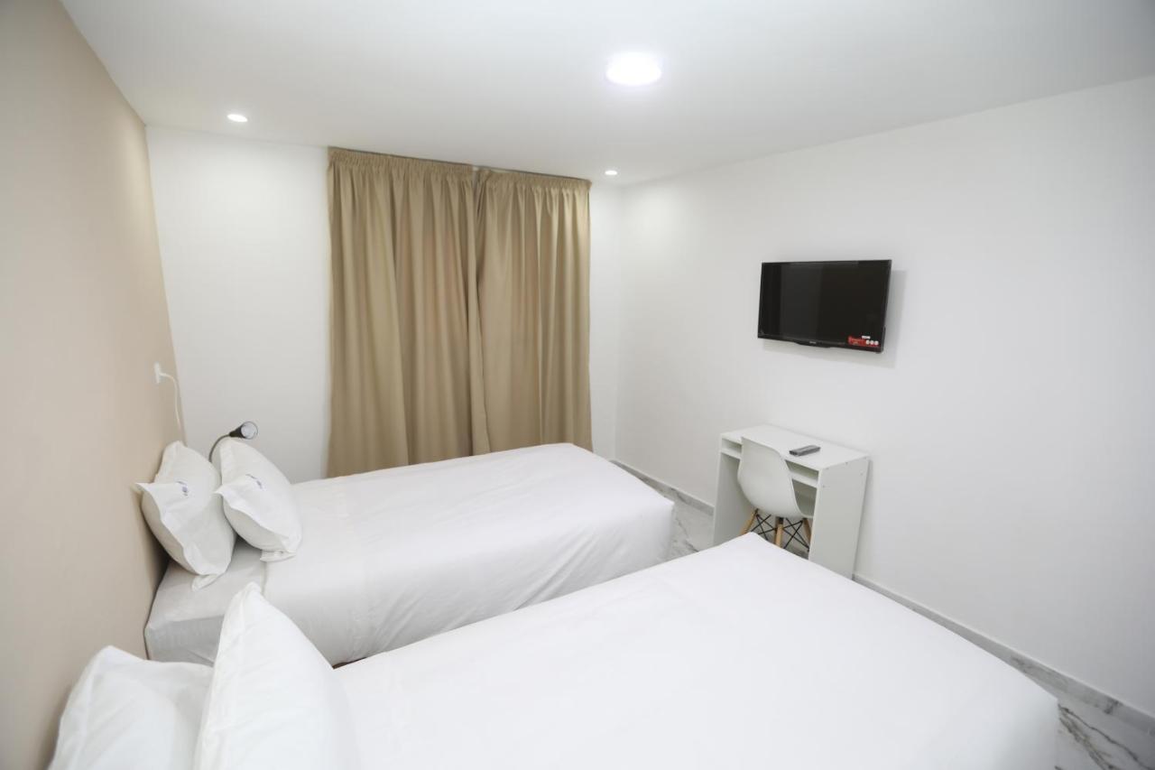 Mji Group Hotel Тан-Тан Екстериор снимка