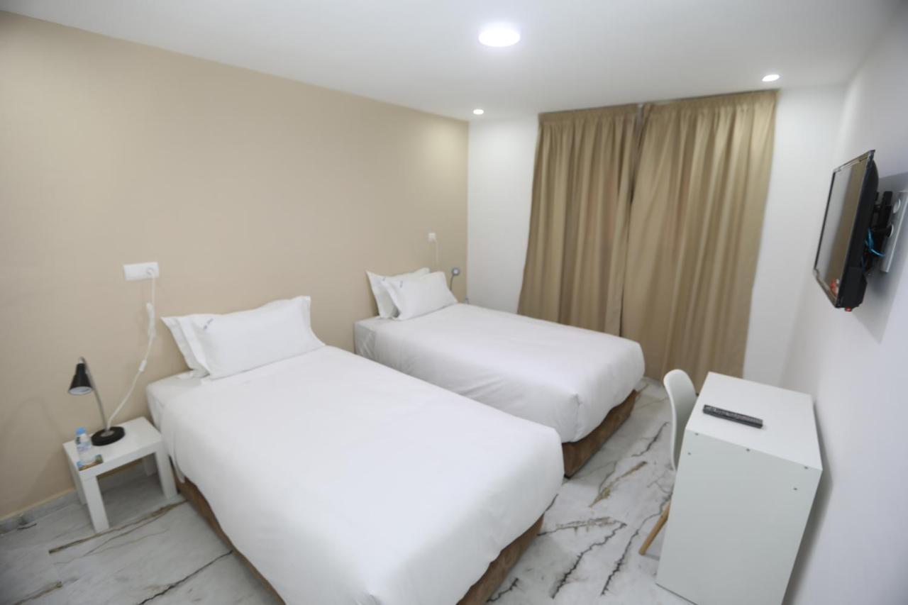 Mji Group Hotel Тан-Тан Екстериор снимка